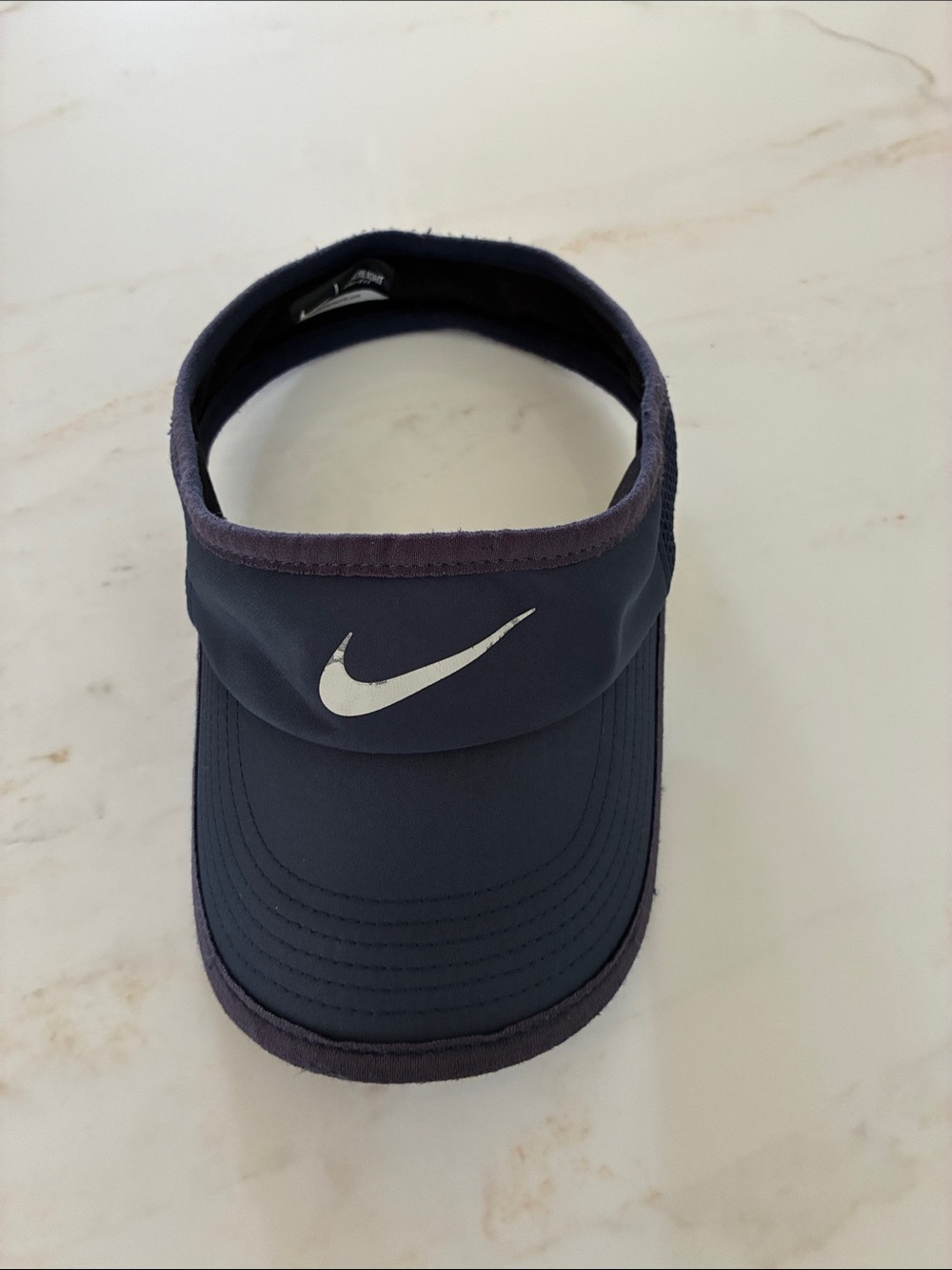 Nike Men’s Navy Blue featherlight Dri Fit Visor with silver Swoosh
